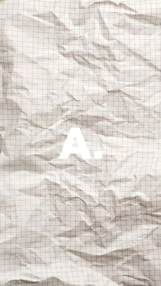 Weißes A.-Zeichen auf strukturiertem Papier